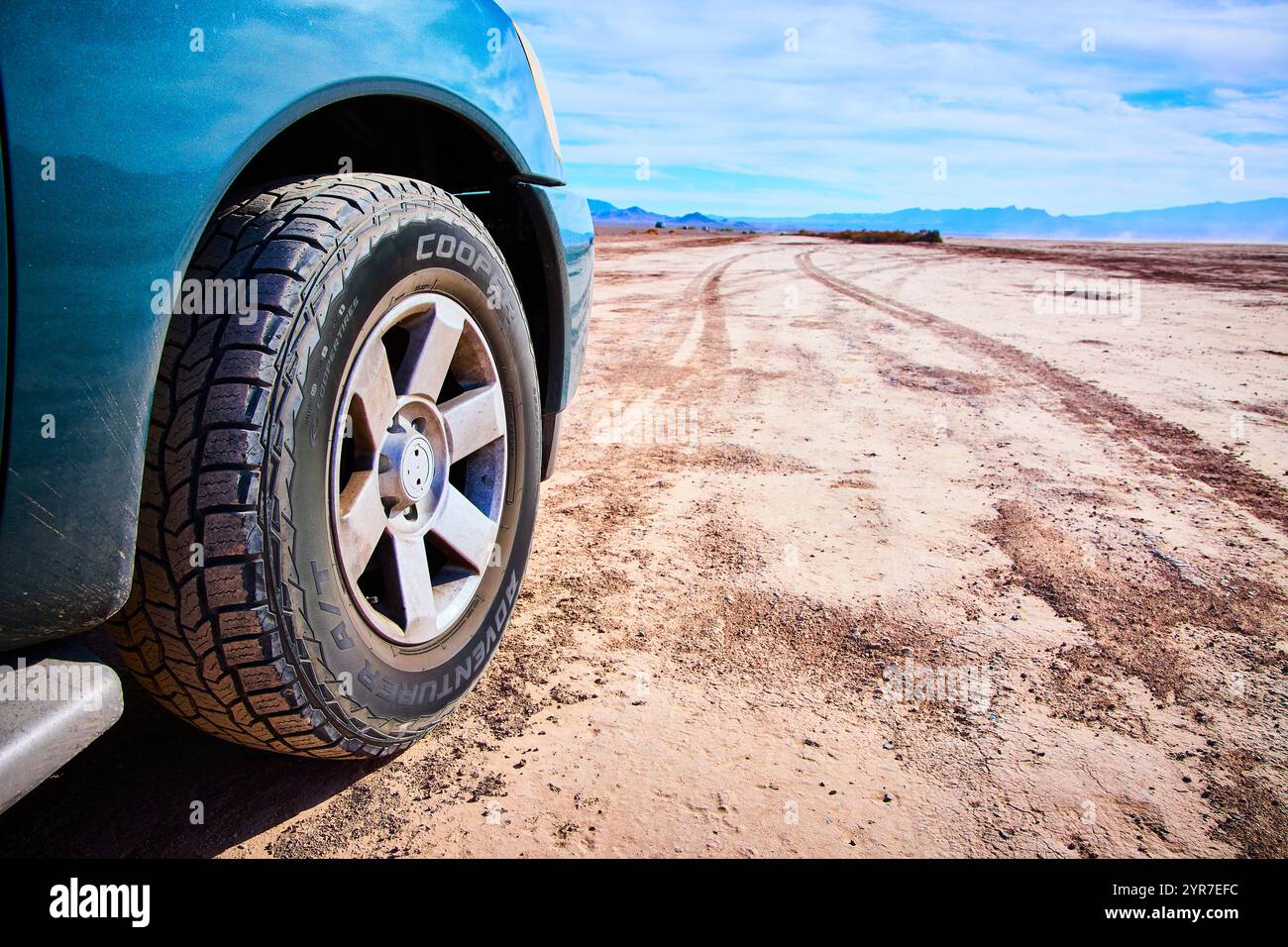Photo inspiration: Gallery Detail: Off Road Tire On Desert Terrain With Mountain View Low