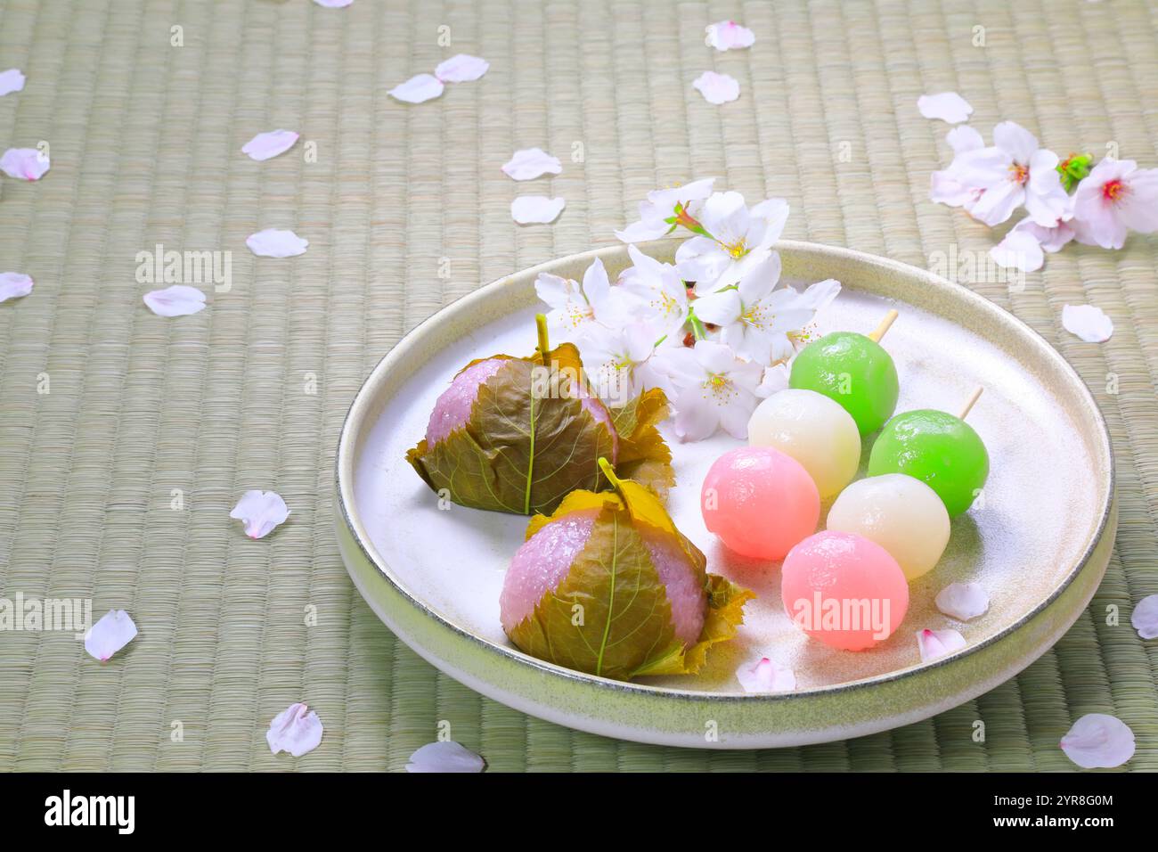 Spring Into Sweets Spring Japanese sweets and cherry petals Stock Photo - Alamy