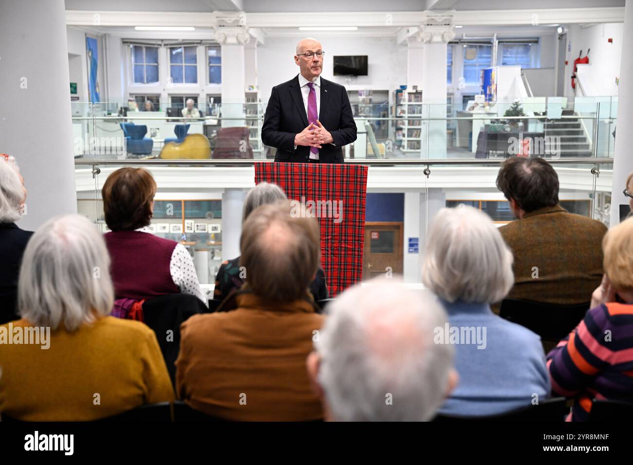 First Minister John Swinney in Edinburgh speaking after Peter MacKay was announced as the new Makar (National Poet for Scotland). The position of Makar involves producing work relating to significant national events and taking a leadership role in promoting poetry nationally. Picture date: Monday December 2, 2024. Stock Photo