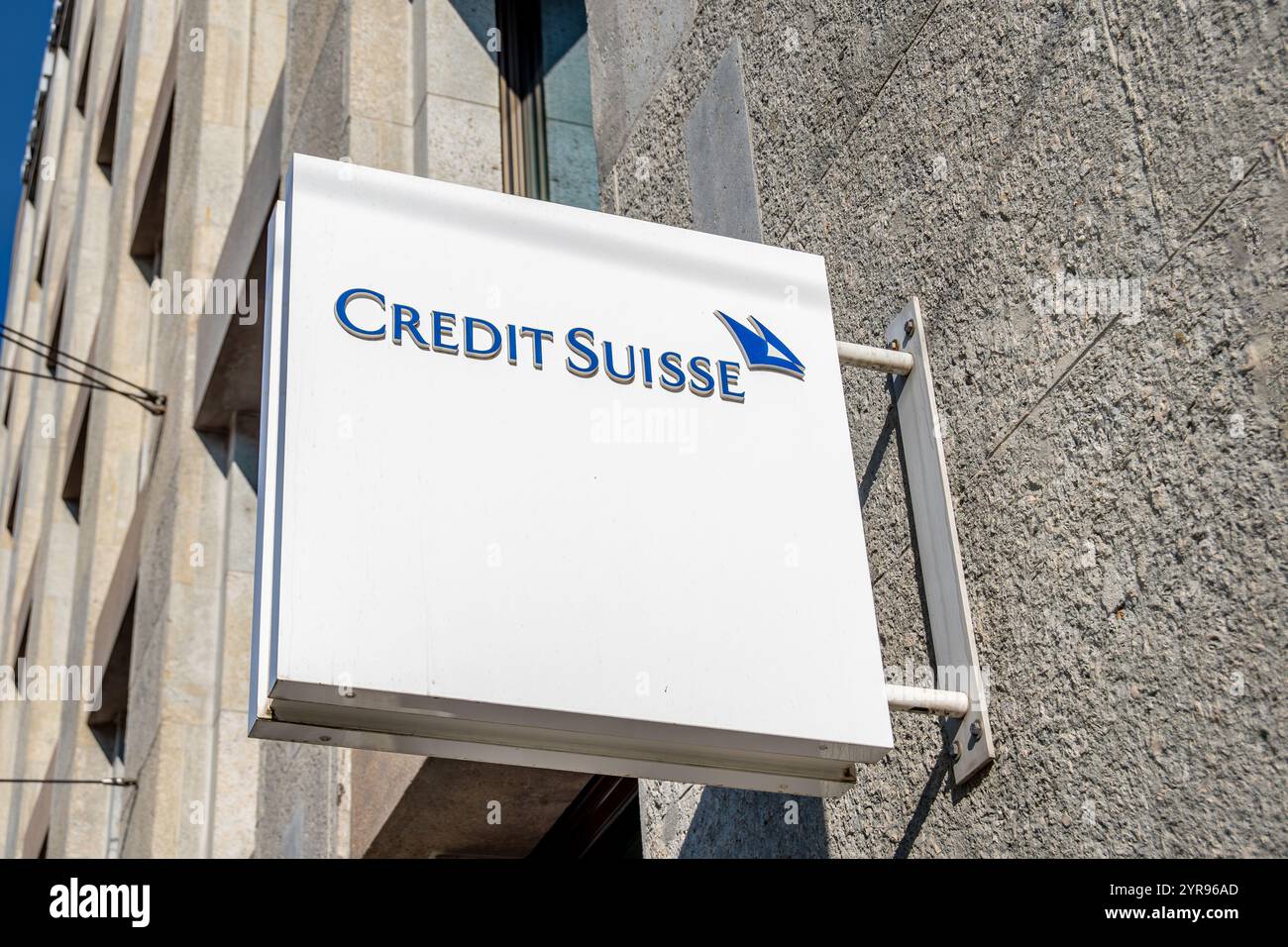 Sign and logo on a building of Credit Suisse Group AG, a former Swiss banking group, acquired in 2023 and merged with UBS. Geneva, Switzerland Stock Photo