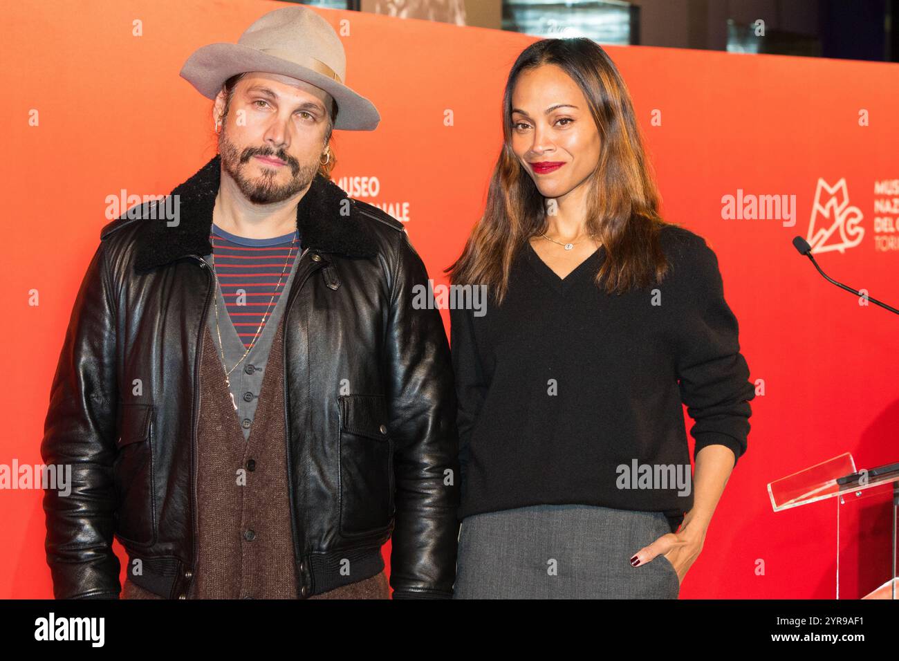 Turin, Italy. 3rd Dec, 2024. Actress Zoe Saldana with husband film
