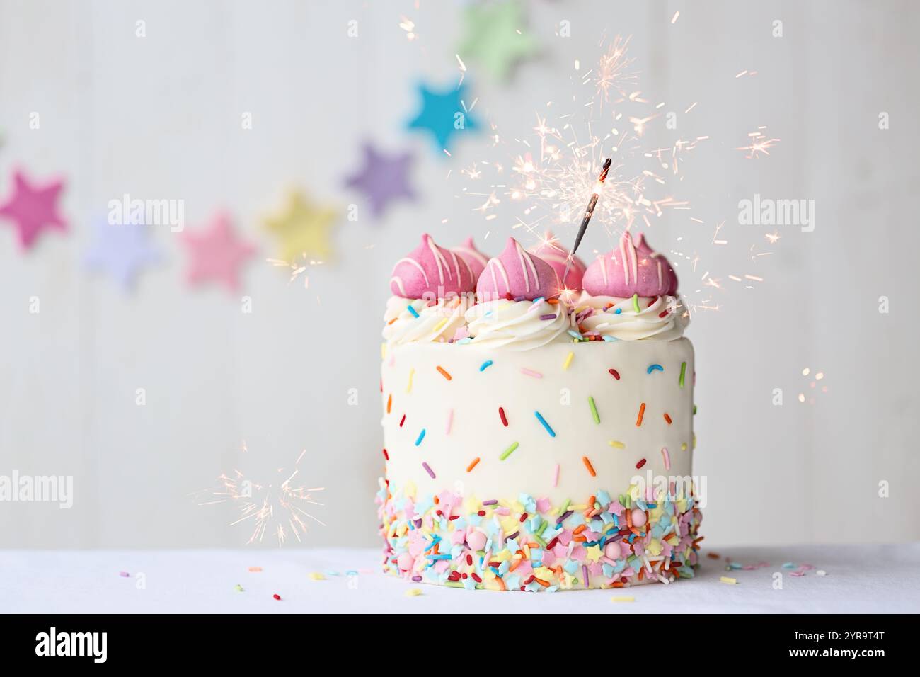 Birthday Cake With Colorful Sprinkles And Celebration Sparklers With 