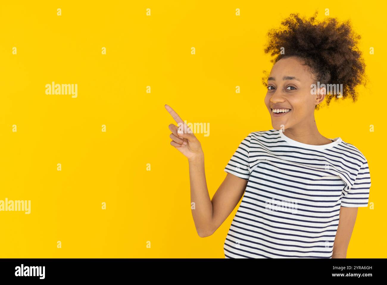 Young teenager pointing finger hi-res stock photography and images - Alamy