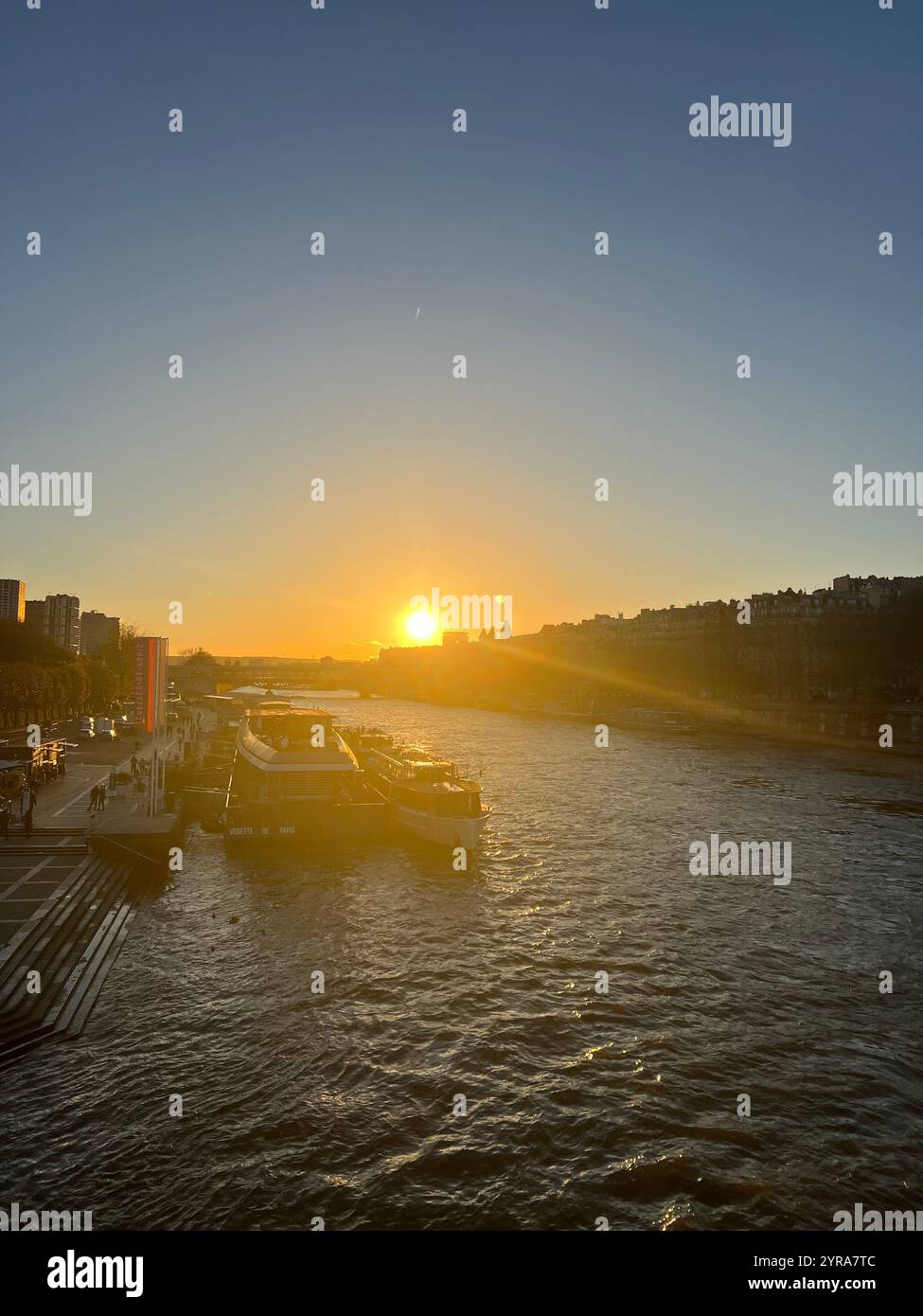 Sunset and the Seine on an clear evening from the Pont de Bir Hakeim - Smartphone Captured Stock Image