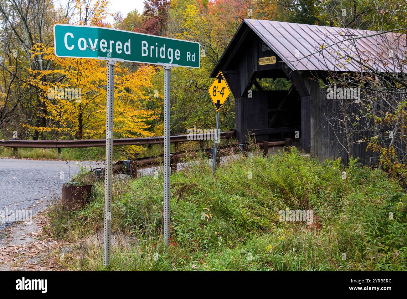 OCTOBER, 2021, STOWE, VERMONT, USA - Gold Brook Covered Bridge, also known as Stowe Hollow Bridge or Emily's Bridge, is a small wooden covered bridge in the town of Stowe, Lamoille County, Vermont Stock Photo