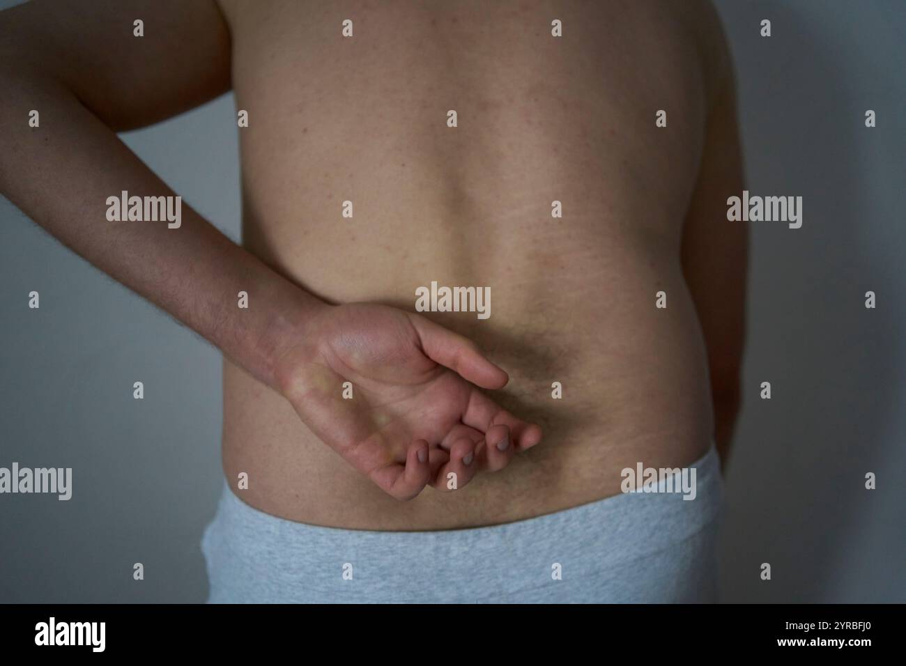 Lower back injury treatment hi-res stock photography and images - Alamy