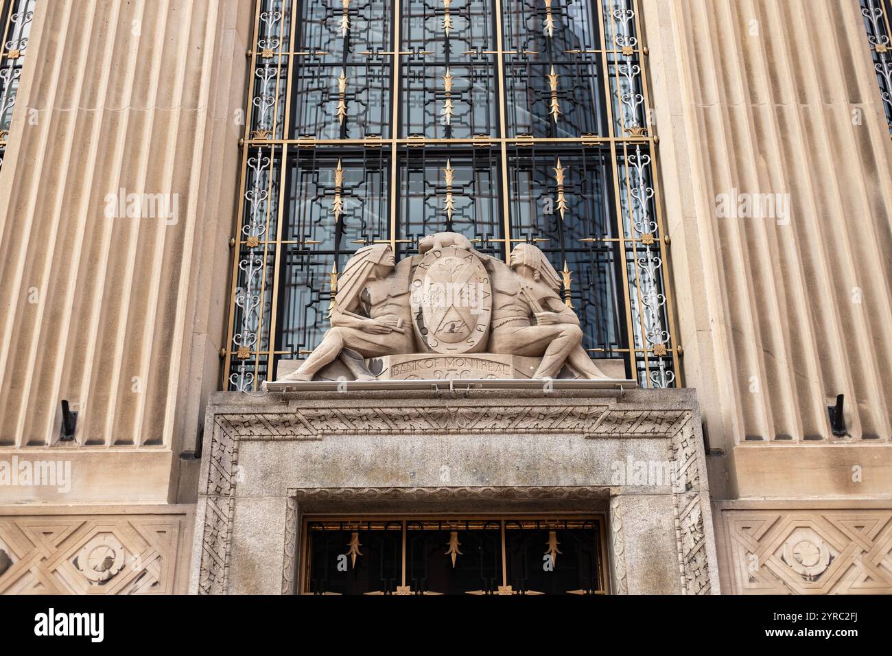 View of Ornate sculpture and Art Deco grille adorn the Bank of Montreal in ...