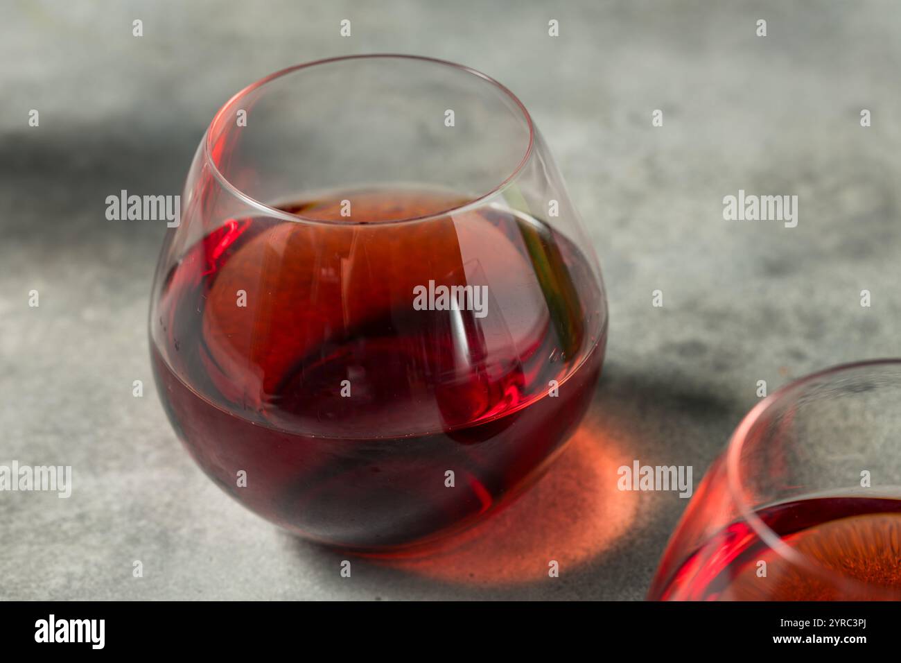 Fancy Boozy Pinot Noir Red Wine in a Glass Stock Photo