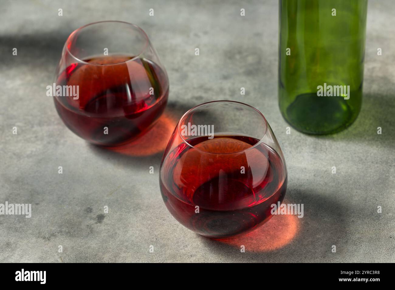 Fancy Boozy Pinot Noir Red Wine in a Glass Stock Photo