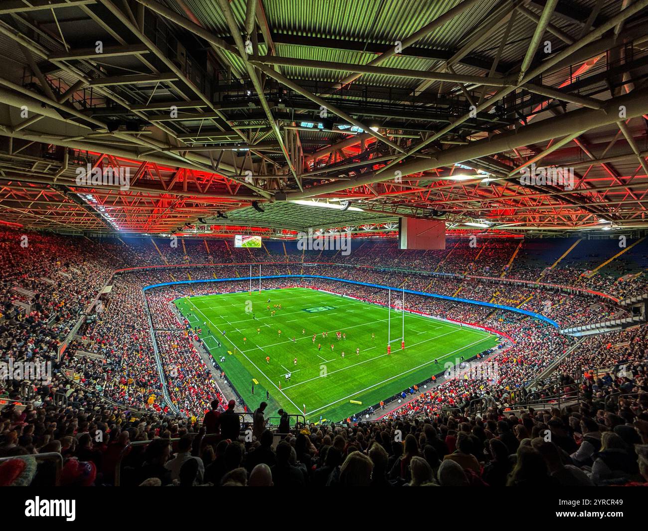 Cardiff, Wales, UK - 17 November 2024: Wide angle view of a  international rugby match played under the closed roof of the city's Principality Stadium - Smartphone Captured Stock Image