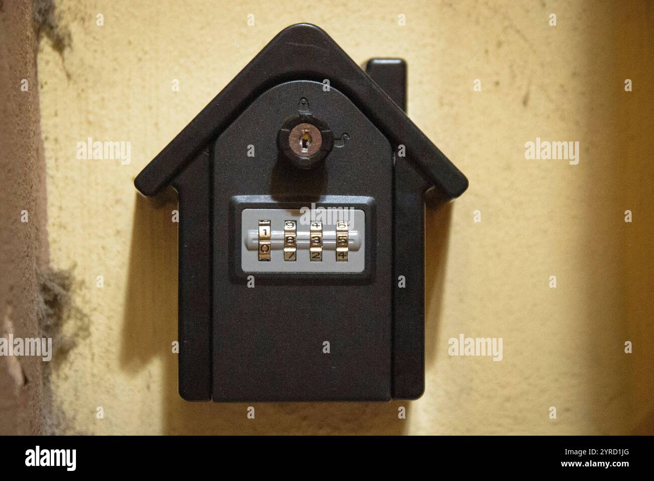 december-3-2024-rome-italy-a-house-shaped-keybox-in-a-somewhat