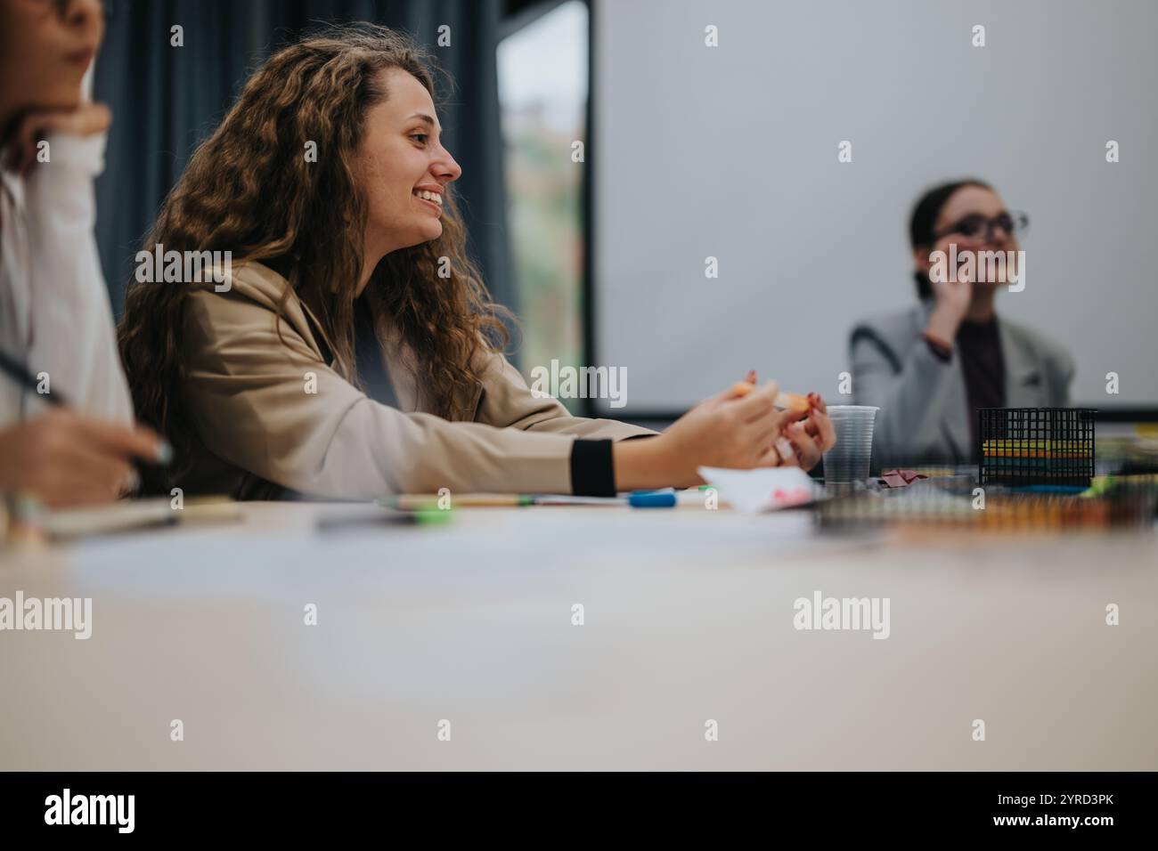 Engaged students participating in an interactive classroom discussion Stock Photo