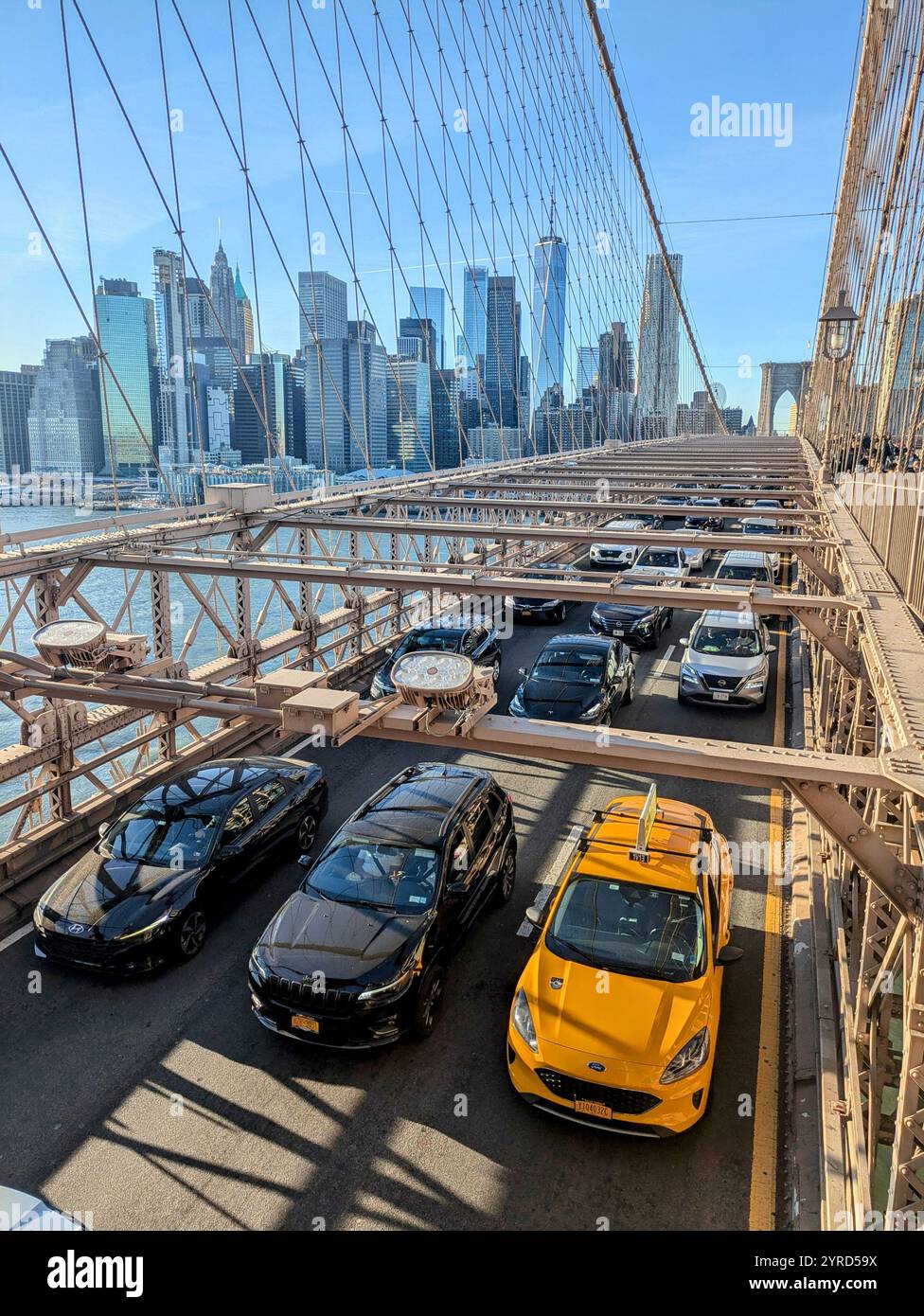 view of new york skyline from Brooklyn Bridge - Smartphone Captured Stock Image view of new york skyline from Brooklyn Bridge - Smartphone Captured Stock Image