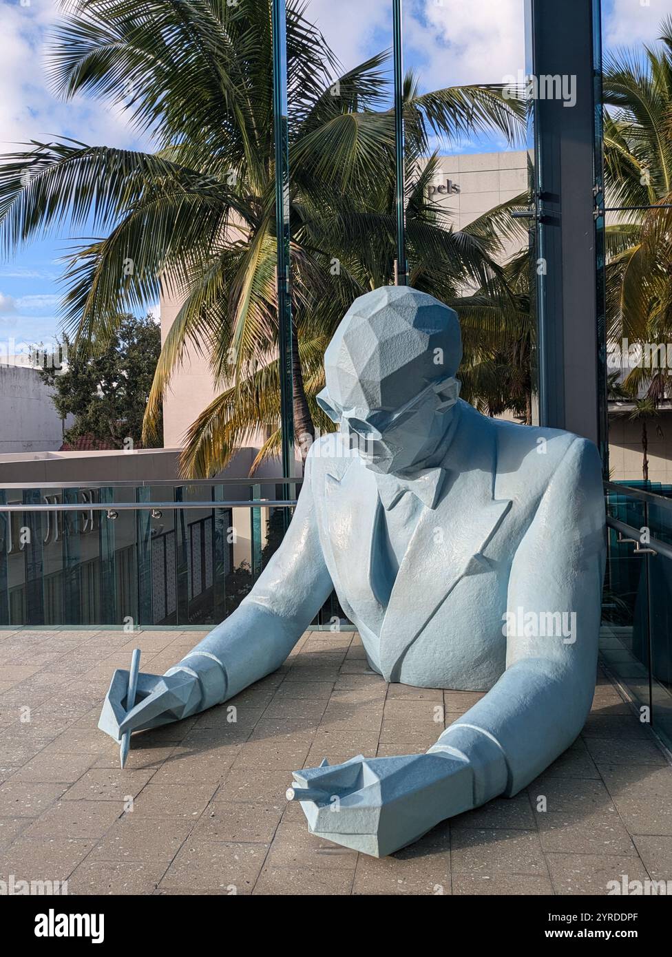 Large Scultpure of Man Writing in Miami Design District Stock Photo - Alamy