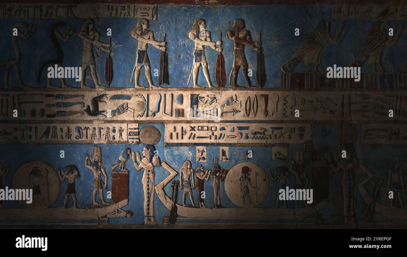 Hieroglyphic carvings and paintings on wall Stock Photo - Alamy