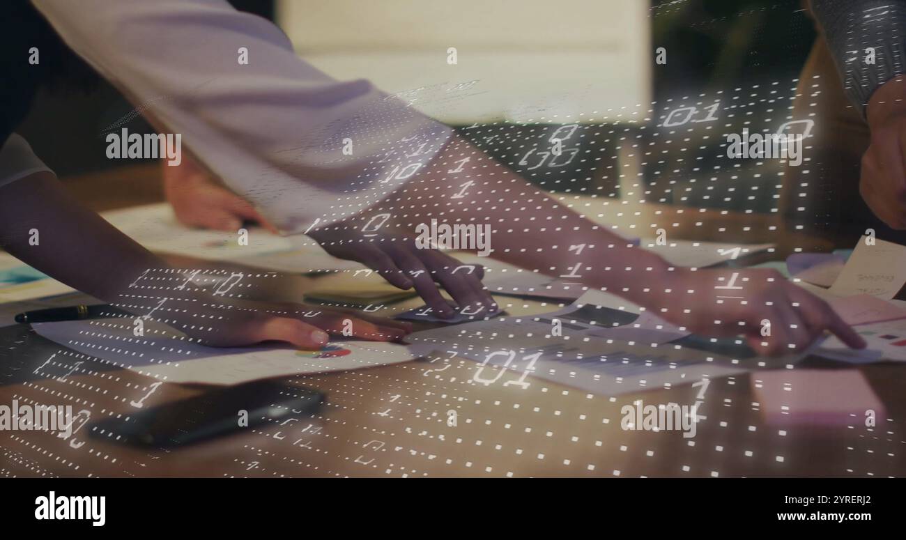 Image of binary coding over diverse colleagues discussing project Stock Photo