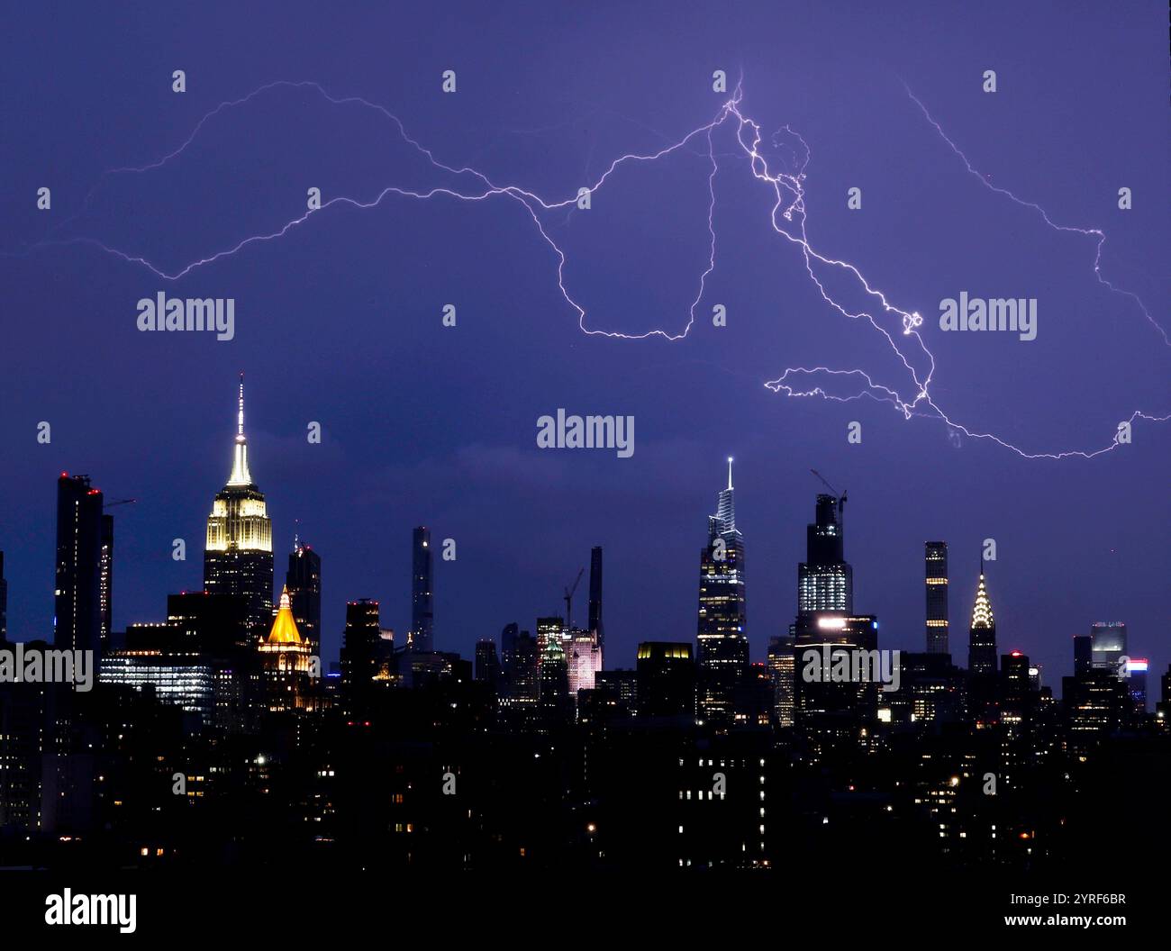 New York, United States. 03rd Aug, 2024. Lightning bolts shoot across ...