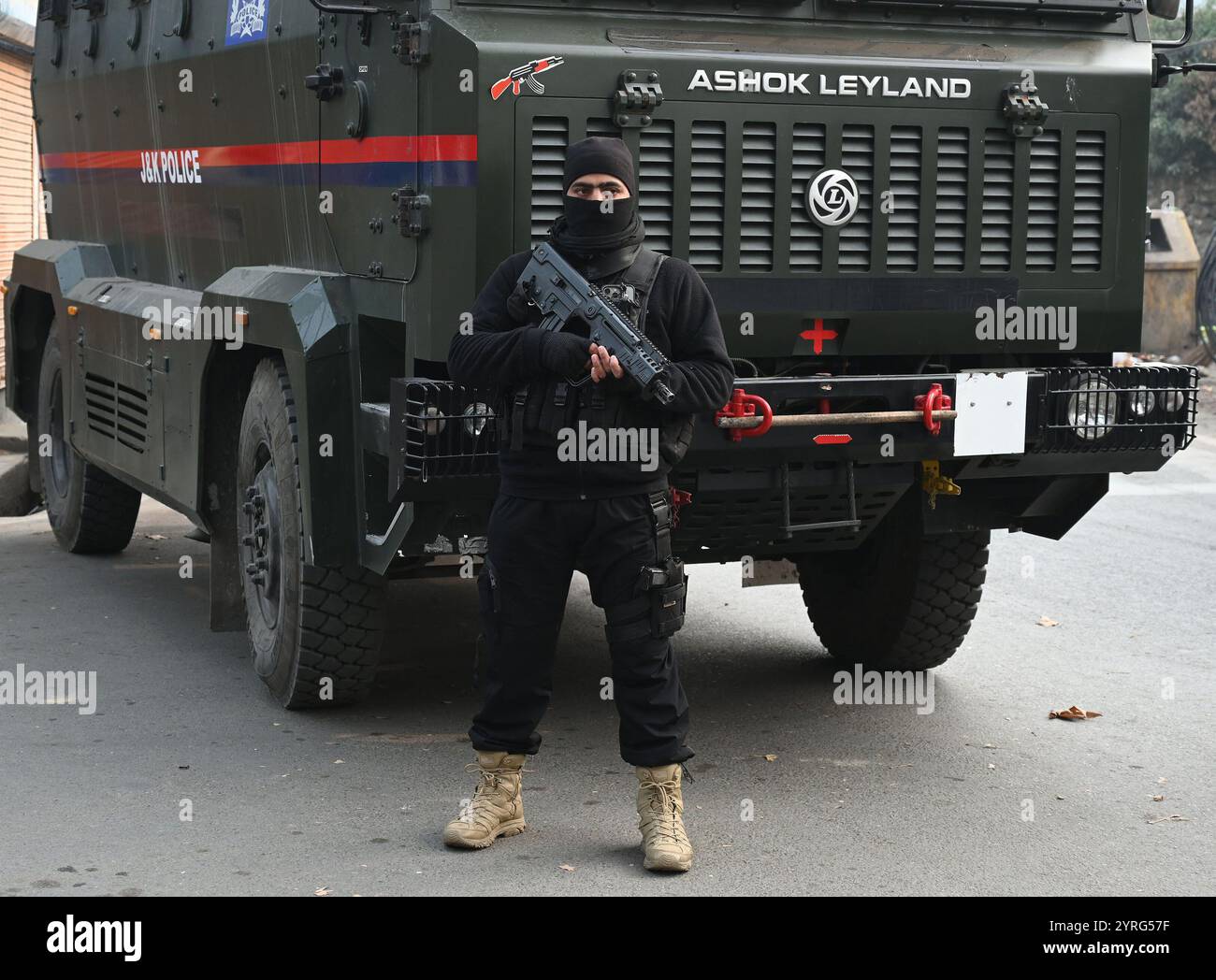 SRINAGAR, INDIA - DECEMBER 3: Policemen of Special Operation Group (SOG ...