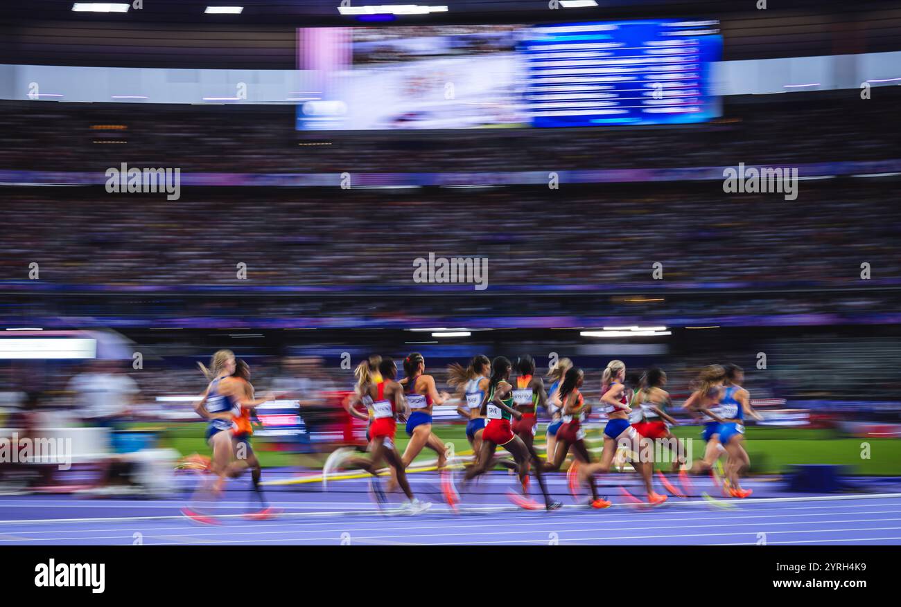 Image of Runners in motion in the 5000 meters at the Paris 2024 Olympic ...