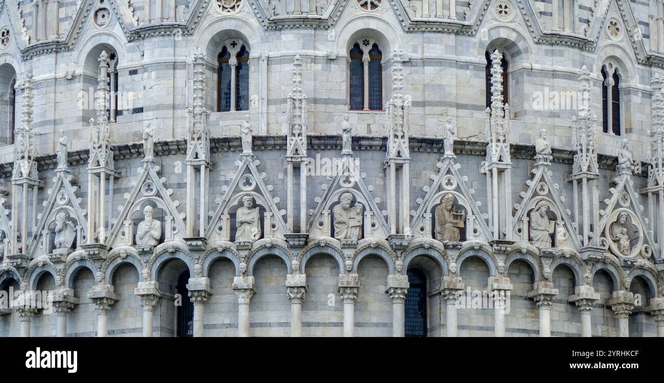 Detailed facade of a Gothic cathedral showcasing intricate stone ...