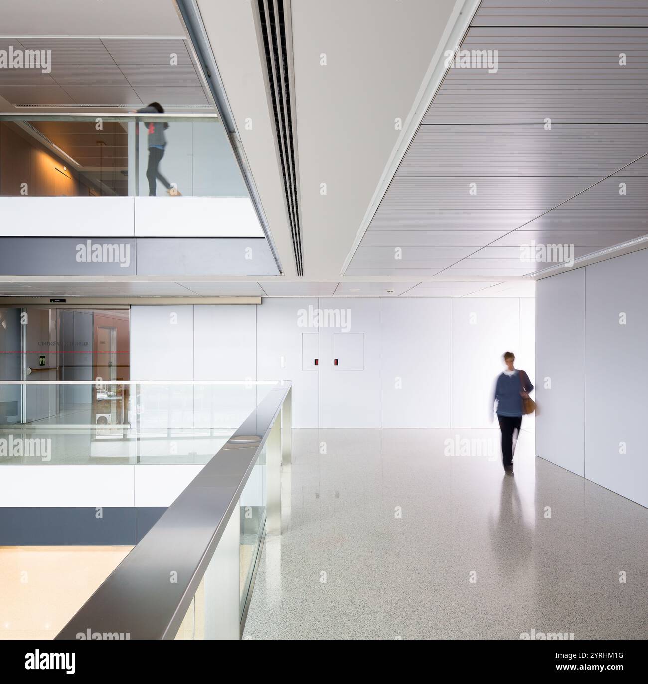 A modern hospital interior featuring bright, expansive corridors and ...