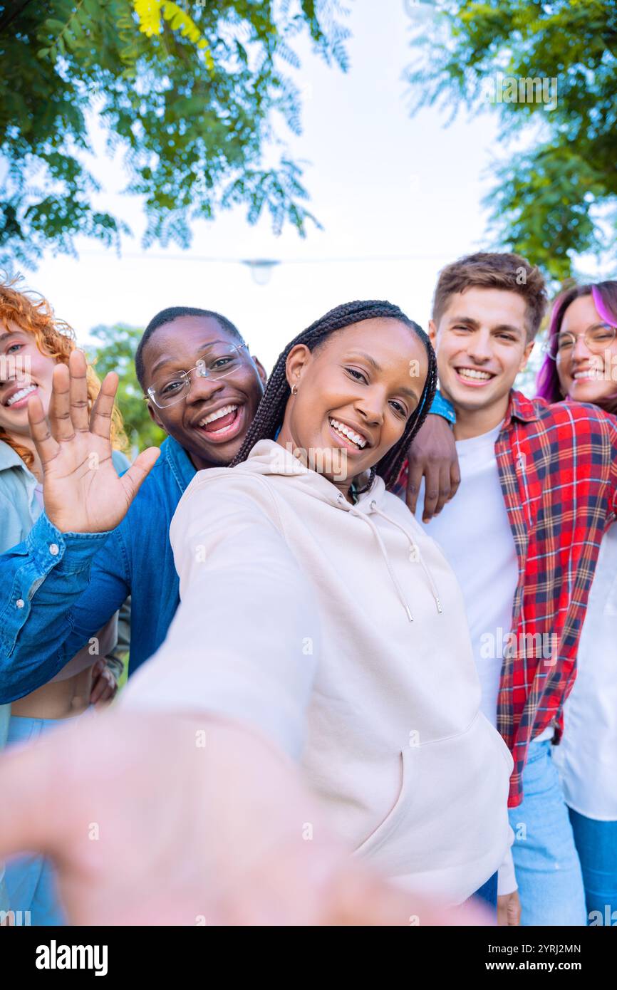 Diverse group people smiling waving hi-res stock photography and images ...