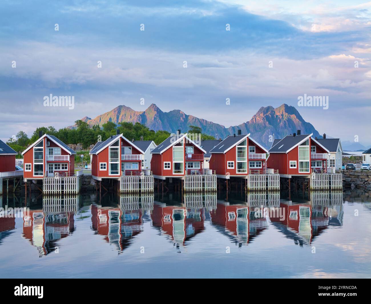 Svolvaer, Norway - Jun 19 2024: Taken at 00:04 (4 minutes after midnight), waterside houses in Svolvaer in the Lofoten Islands, Norway Stock Photo