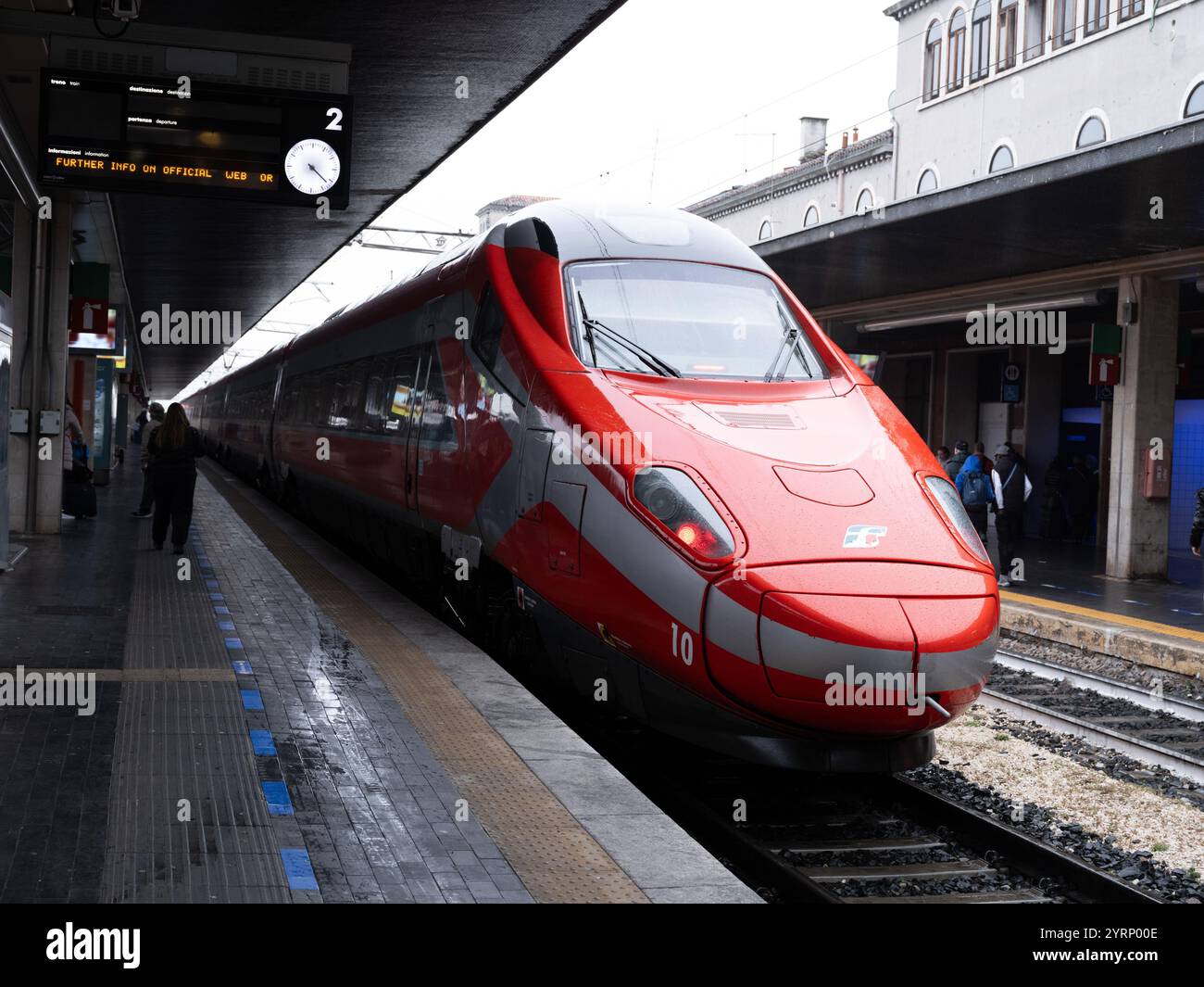 Fast red bullet train at a platform in Venice, Italy Stock Photo
