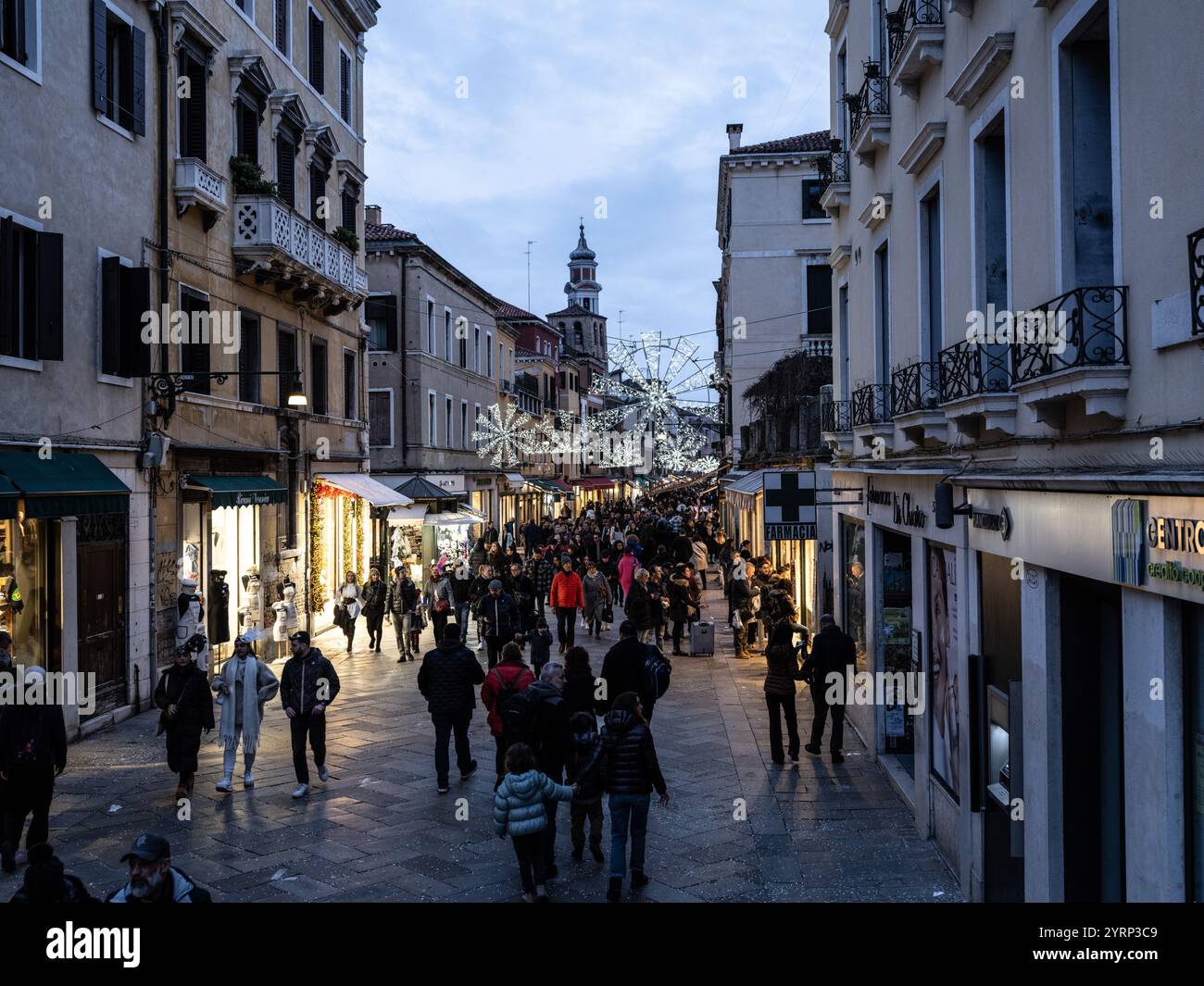 NIght streets of Venice, Italy in winter during the carnival season. Stock Photo
