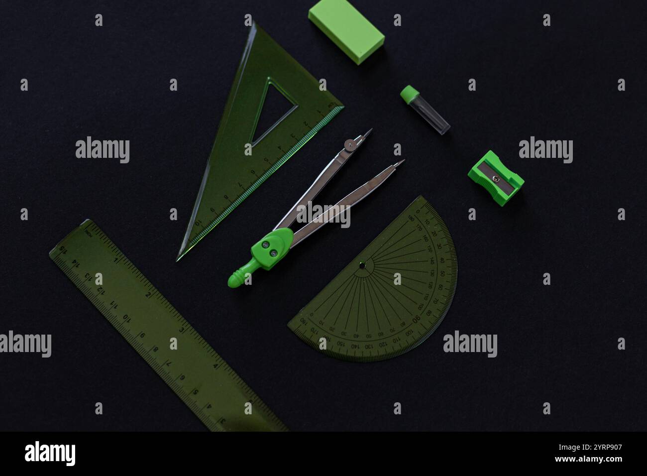 geometry set with rulers, compass, eraser, sharpener and graphite rods ...