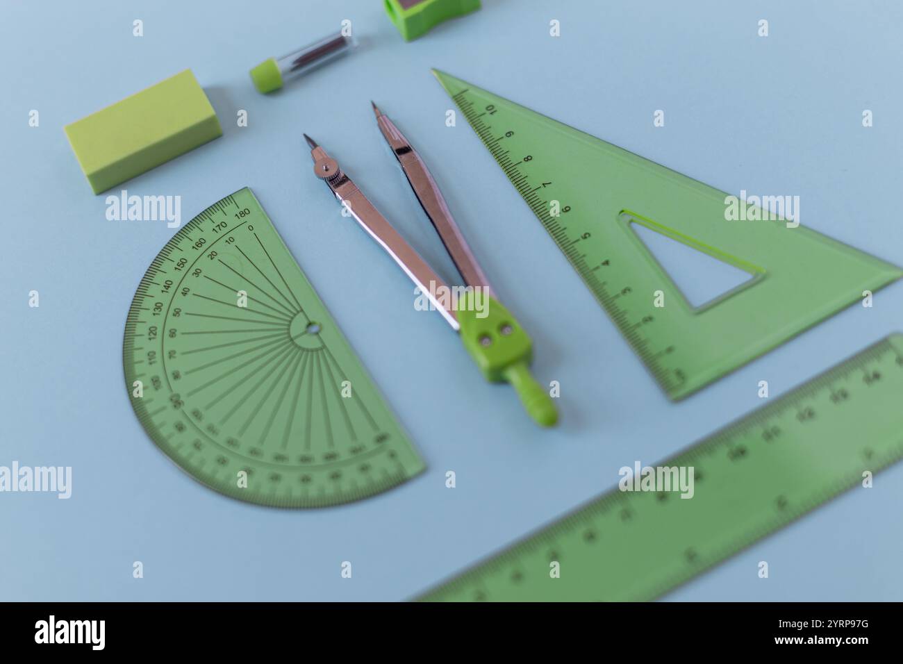 Rules Compasses Rulers tools on green hi-res stock photography and images - Alamy