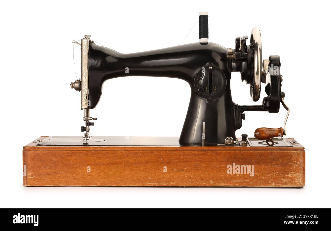 One vintage sewing machine isolated on white Stock Photo - Alamy