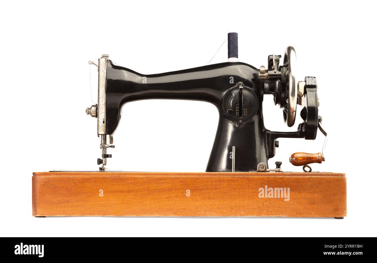 One vintage sewing machine isolated on white Stock Photo - Alamy