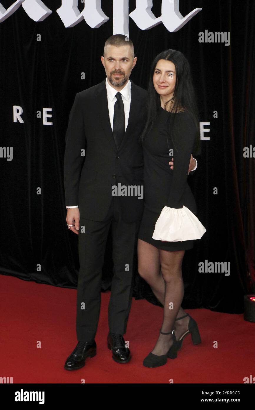 Robert Eggers and woman Alexandra Shaker at the premiere of Nosferatu at the Zoo Palast in Berlin on 2 December 2024 Stock Photo