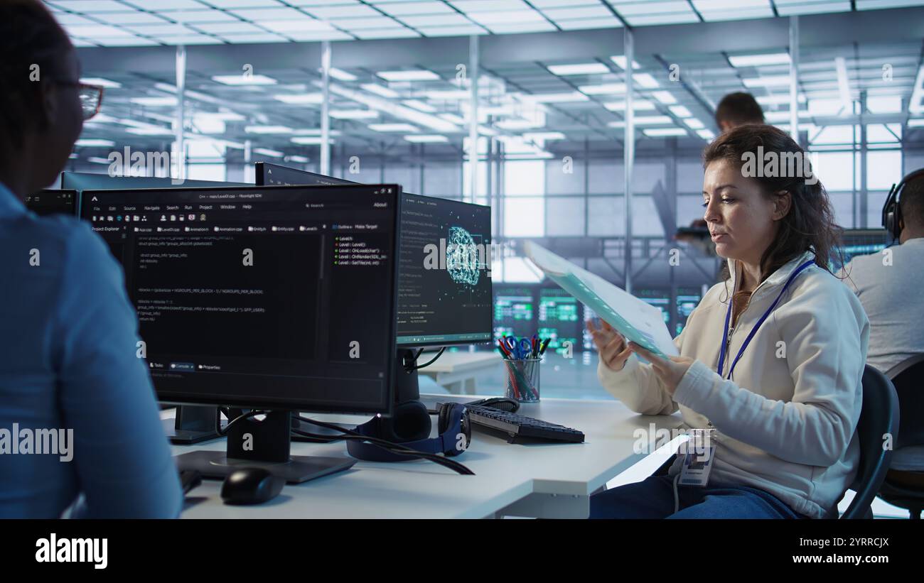 Data center admin reading paperwork hi-res stock photography and images ...