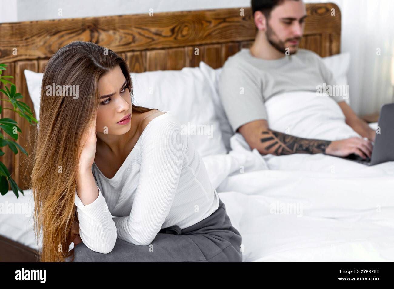 Relationship, problems, a lot of work and virtual treason Stock Photo