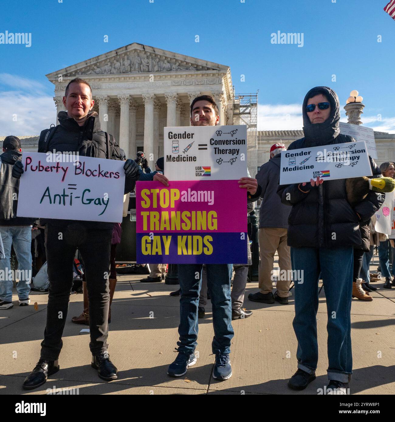 Washington, District Of Columbia, USA. 4th Dec, 2024. Supporters of gender-affirming care for transgender youth rally outside the U.S. Supreme Court as it heard oral arguments on whether Tennessee can ban puberty blockers and hormone therapy for transgender teens. The key issue in United States v. Skremetti is whether banning health care for one group violates the 14th amendmentÃs equal protection clause. Currently 26 states have passed such laws. (Credit Image: © Sue Dorfman/ZUMA Press Wire) EDITORIAL USAGE ONLY! Not for Commercial USAGE! Stock Photo