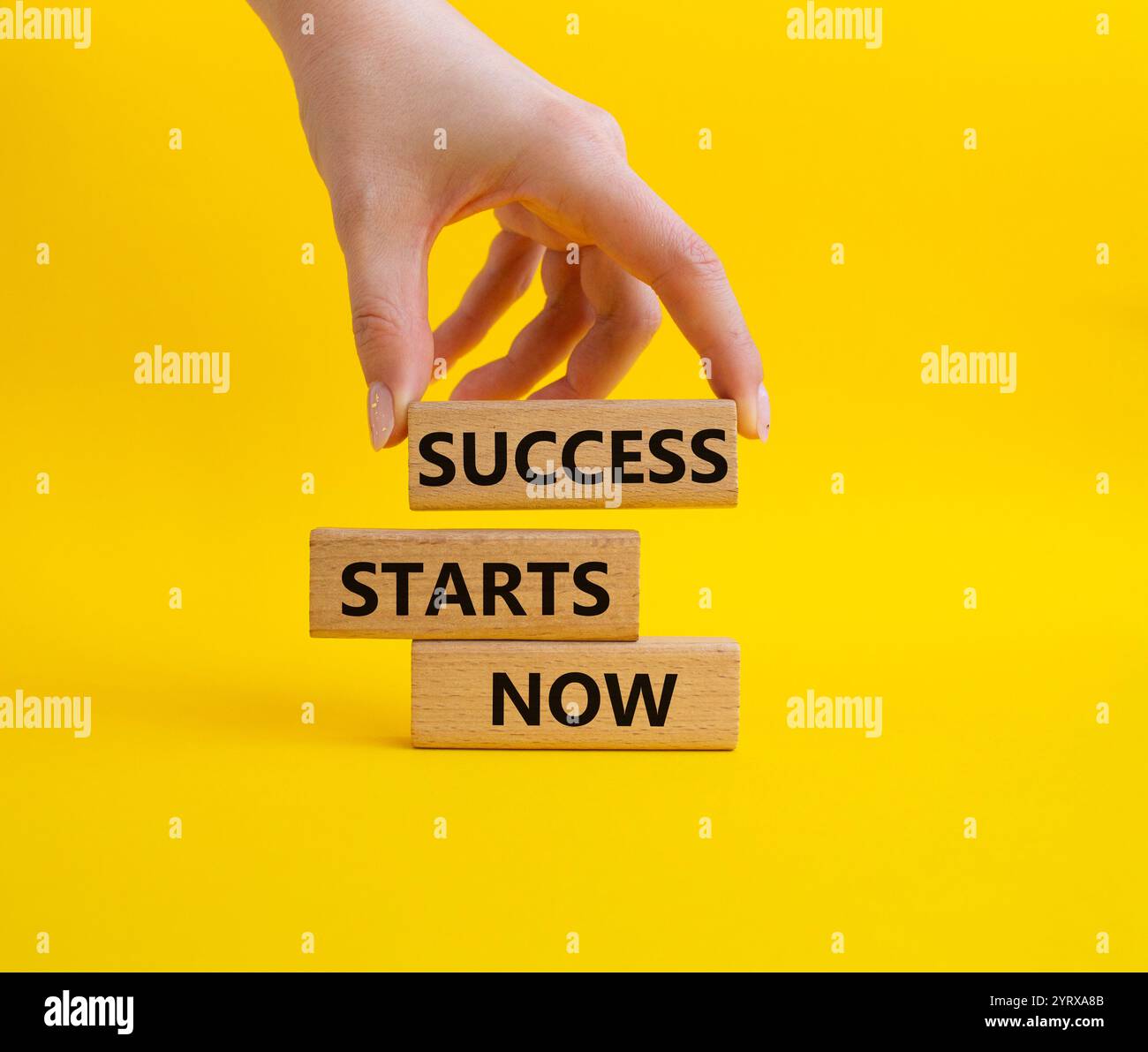 Success Starts Now symbol. Concept words Success Starts Now on wooden