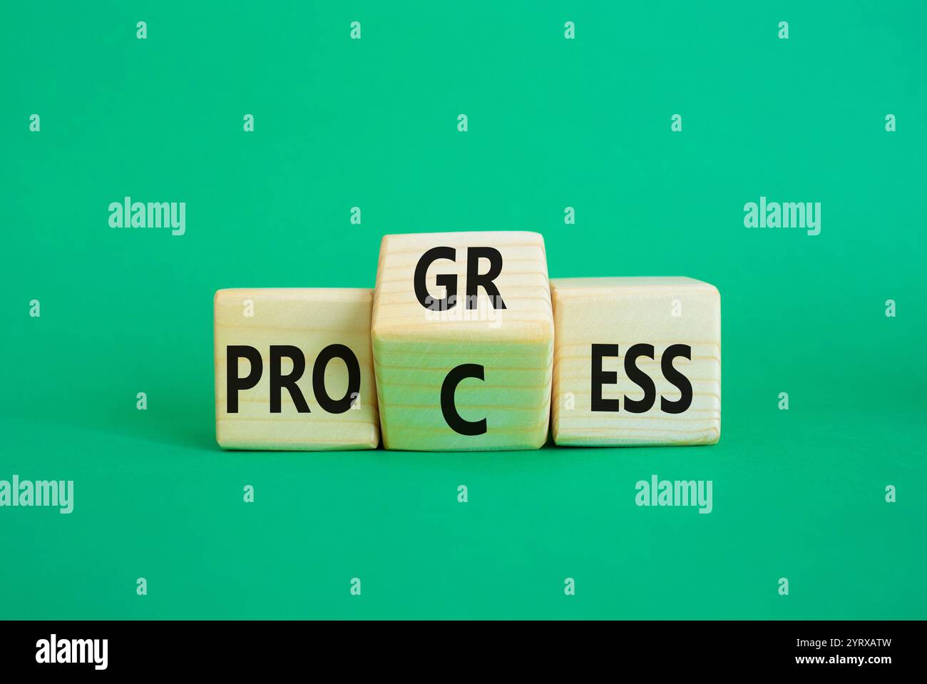 Process and progress symbol wooden cubes with words process and