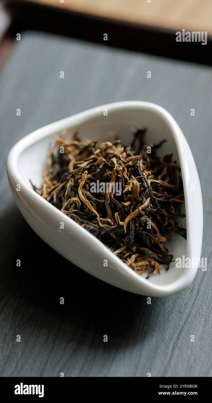 Delicate, aromatic Black Tea Leaves presented beautifully in a Modern ...
