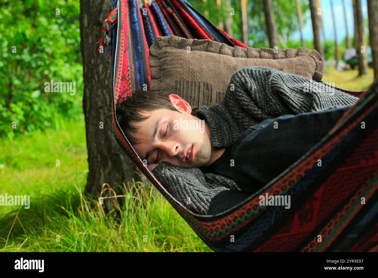 Man sleeping in the forest hi-res stock photography and images - Alamy