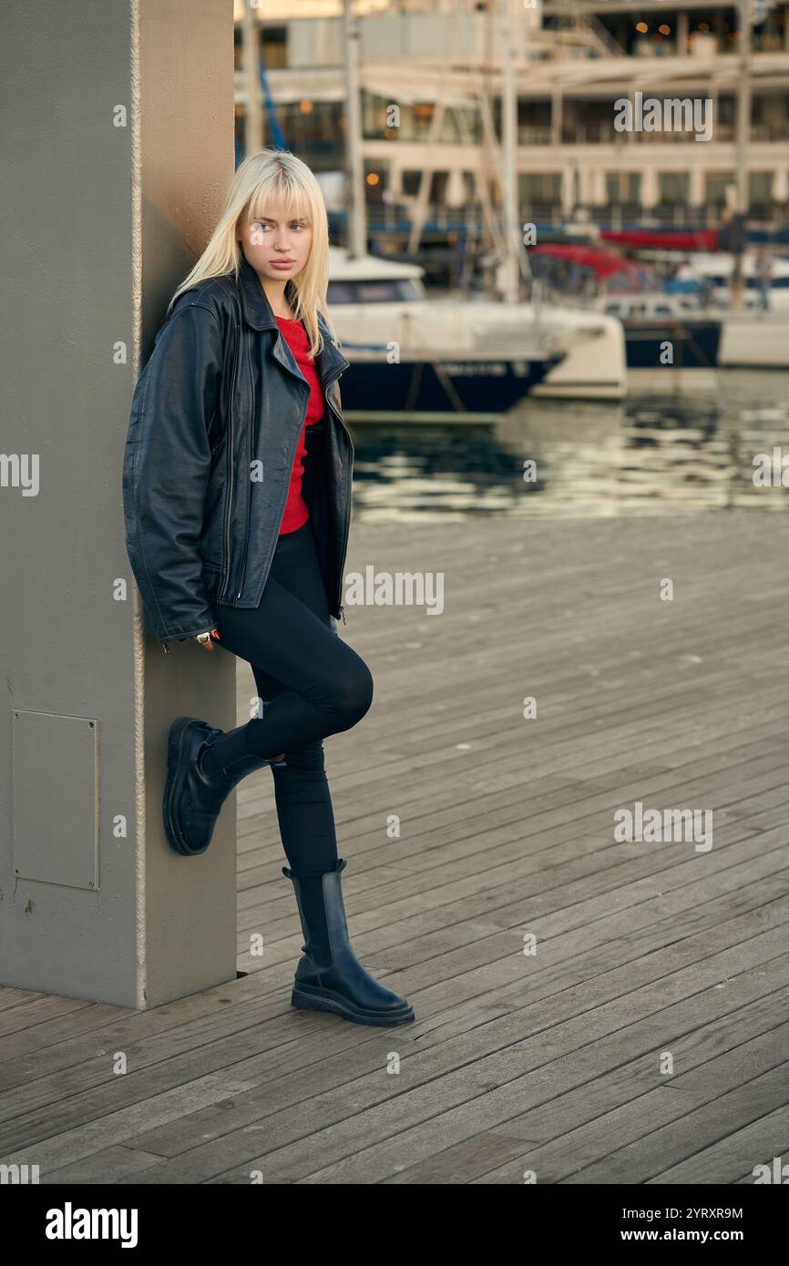 Blonde woman in leather hi-res stock photography and images - Alamy