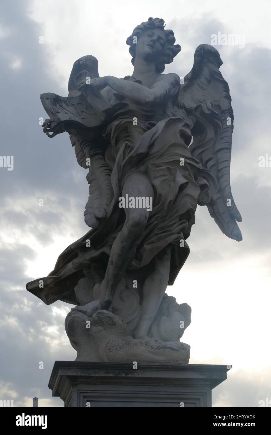 Sculpture of an angel on the Ponte Sant'angelo, once the Aelian Bridge or Pons Aelius, meaning the Bridge of Hadrian, is a Roman bridge in Rome, Italy Stock Photo
