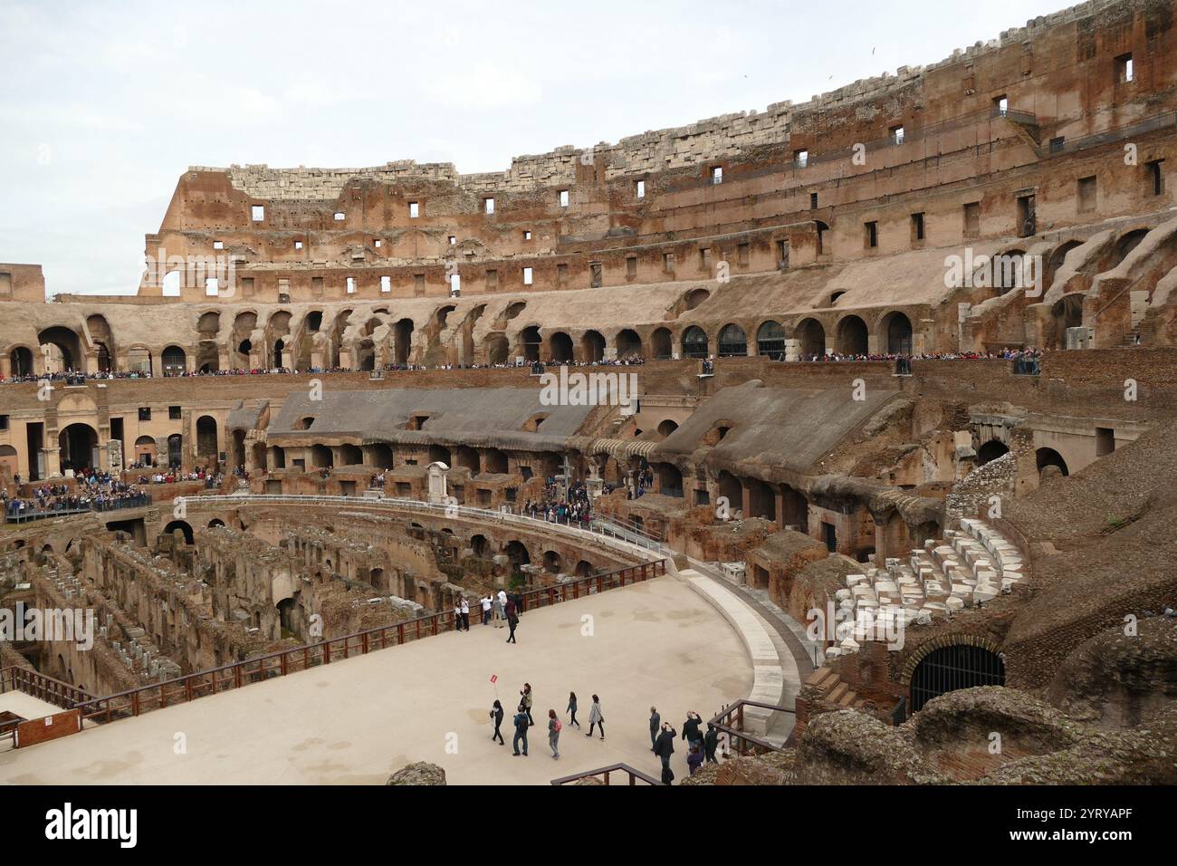 The Colosseum or Coliseum, amphitheatre in the centre of the city of Rome, Italy. Built of travertine, tuff, and brick-faced concrete, it is the largest amphitheatre ever built. Construction began under the emperor Vespasian in AD 72, and was completed in AD 80 under his successor and heir Titus. Stock Photo