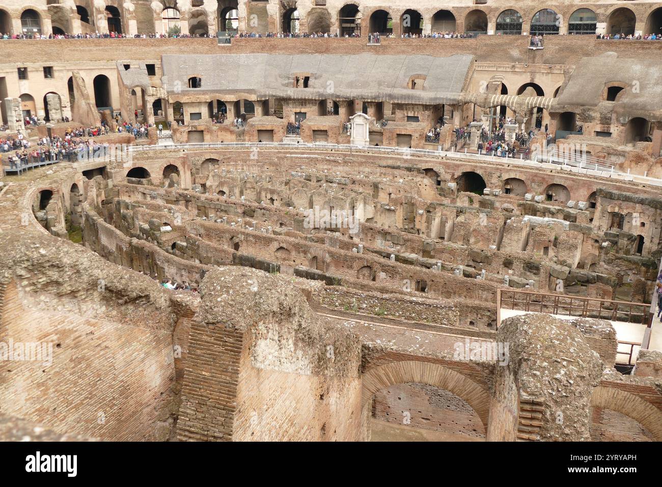 The Colosseum or Coliseum, amphitheatre in the centre of the city of Rome, Italy. Built of travertine, tuff, and brick-faced concrete, it is the largest amphitheatre ever built. Construction began under the emperor Vespasian in AD 72, and was completed in AD 80 under his successor and heir Titus. Stock Photo