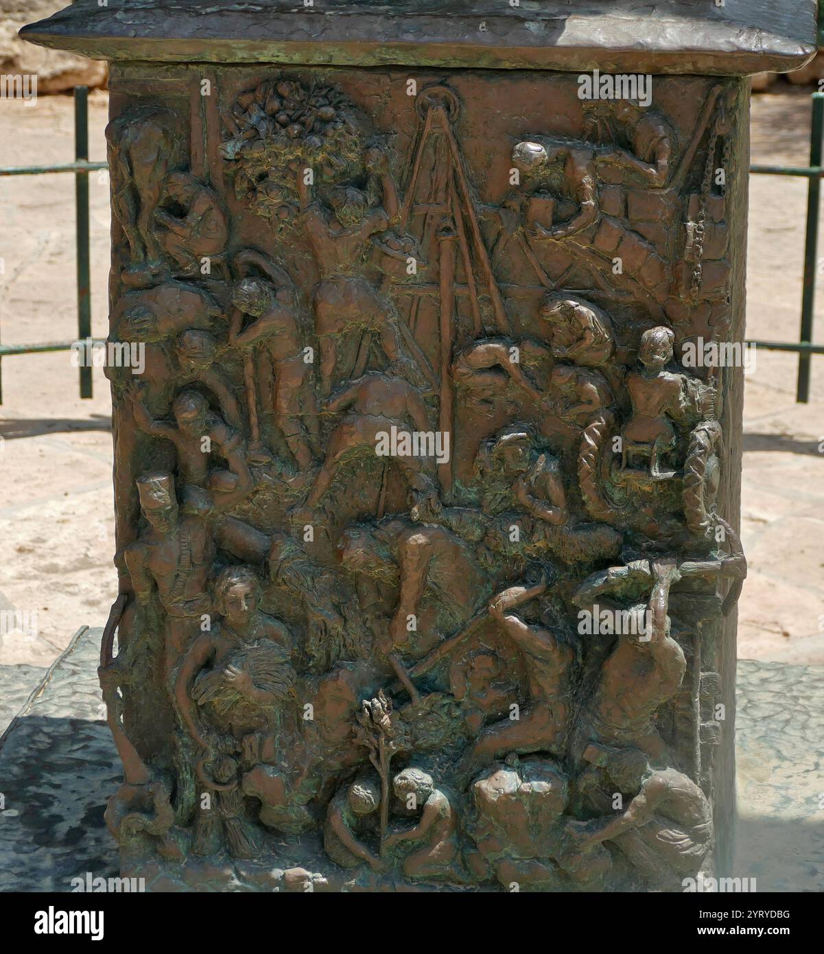 The Knesset Menorah, a bronze Menorah, Jerusalem, Israel. Designed by Benno Elkan (1877-1960), a Jewish sculptor who escaped from his native Germany to Britain. The sculpture is 4.30 meters high, 3.5 meters wide, and weighs 4 tons. It is located at the edge of Gan Havradim (Rose Garden) opposite the Knesset. It was presented to the Knesset as a gift from the Parliament of the United Kingdom on April 15, 1956 in honor of the eighth anniversary of Israeli independence. The Menorah was modelled after the golden candelabrum that stood in the Temple in Jerusalem. A series of bronze reliefs on the M Stock Photo