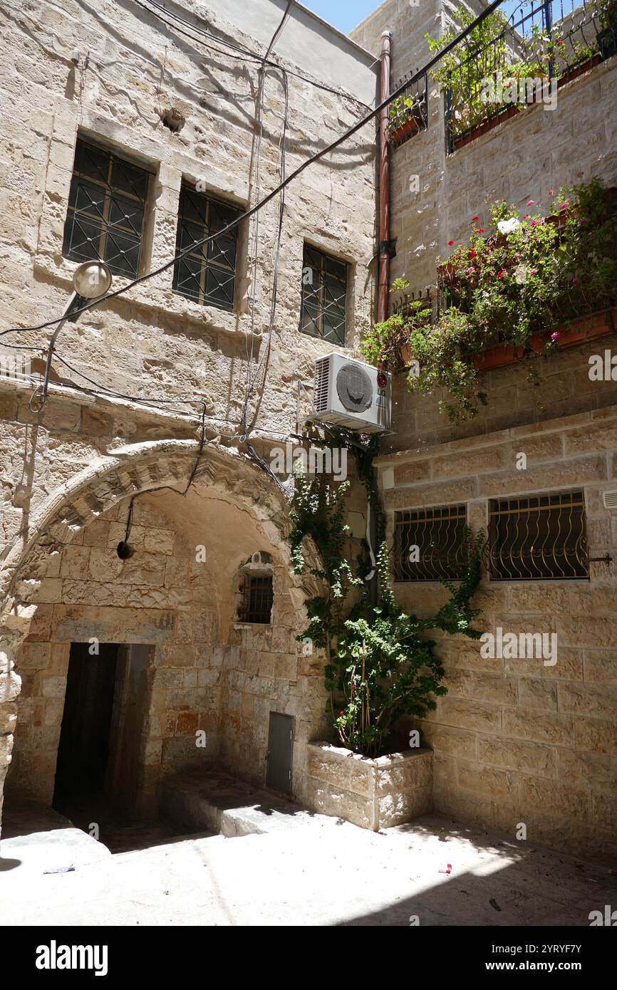 The Muslim Quarter (Harat al-Muslimin), Old city of Jerusalem. It is the largest and most populous of the four quarters and is situated in the north-eastern corner of the Old City Stock Photo