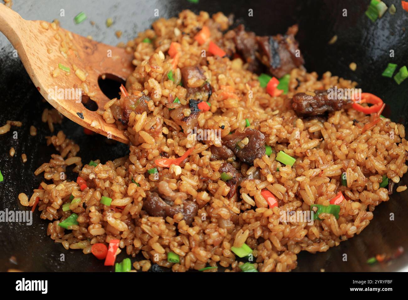 Close Up Cooking Nasi Goreng Kambing or Goat Meat Fried Rice on Black ...