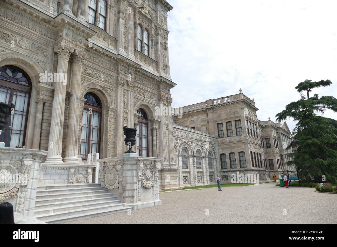 Dolmabahce Palace, Istanbul, Turkey, on the European coast of the Bosphorus, served as the main administrative center of the Ottoman Empire from 1856 - 1887 and 1909 - 1922. Dolmabahce Palace was ordered by the Empire's 31st Sultan, Abdulmecid I, and built between the years 1843 and 1856. The design contains eclectic elements from the Baroque, Rococo and Neoclassical styles, blended with traditional Ottoman architectureDecor and equipment Stock Photo