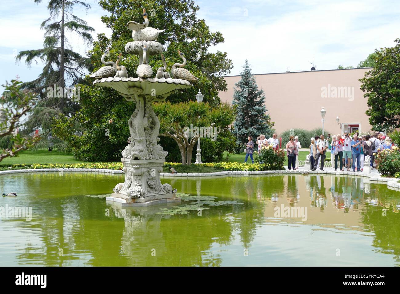 Fountain in the garden, Dolmabahce Palace, Istanbul, Turkey, on the European coast of the Bosphorus, served as the main administrative center of the Ottoman Empire from 1856 - 1887 and 1909 - 1922. Dolmabahce Palace was ordered by the Empire's 31st Sultan, Abdulmecid I, and built between the years 1843 and 1856. The design contains eclectic elements from the Baroque, Rococo and Neoclassical styles, blended with traditional Ottoman architectureDecor and equipment Stock Photo